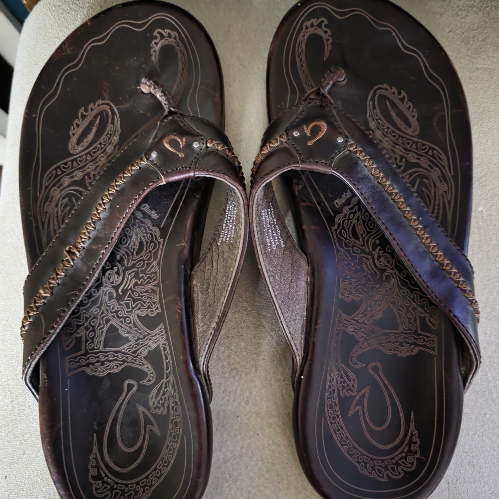 OluKai Brown Flip-Flops with Intricate Design
